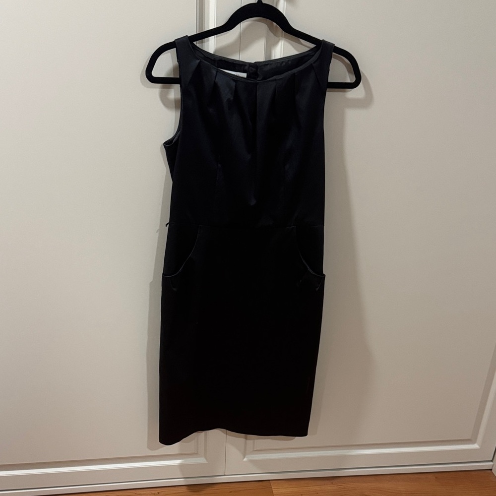 Classic  Satin Black Midi Dress
Perfect “little black dress” with pockets